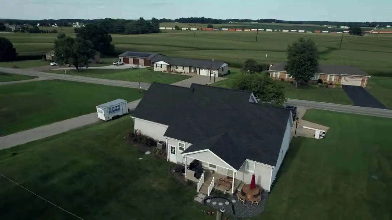 Aerial view over a Southern Indiana subdivision, the first shot of our work montage